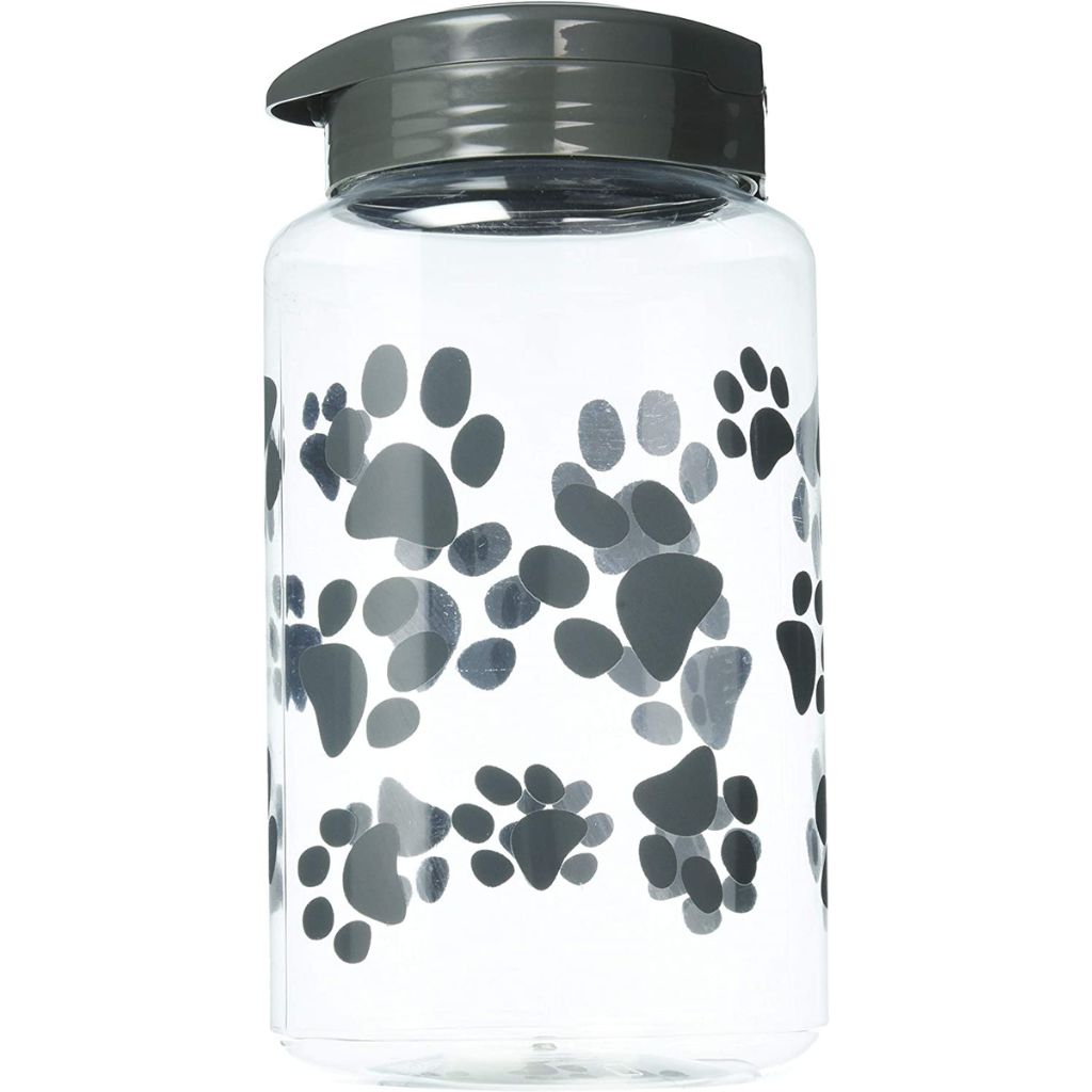 A clear plastic dog treat jar with a black lid, featuring a dog paw prints pattern.